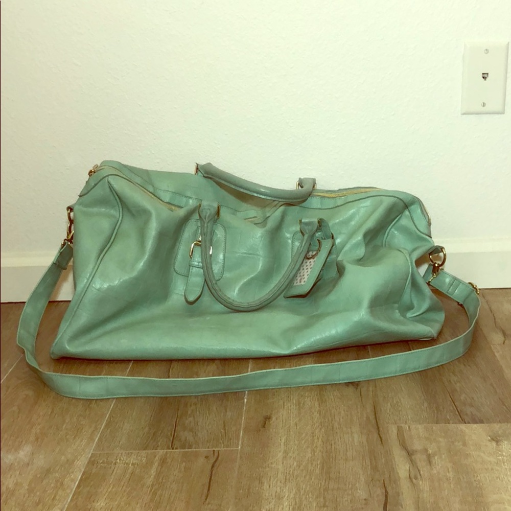 Steve Madden teal duffel bag